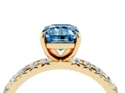Fancy Blue Emerald Cut Diamond Pavé Solitaire Ring Set in Yellow gold with Round Band and Prong Setting