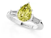 Fancy Yellow Pear Cut Diamond Solitaire Ring Set in Platinum with Tapered Baguette Accents and Prong Setting
