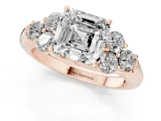 Asscher Cut Diamond Cluster Ring Set in Rose gold with Round Accent Stones and Prong Setting on a Plain Band