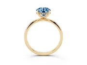 Fancy Blue Round Cut Diamond Solitaire Engagement Ring Set in Yellow gold with Prong Setting and Polished Band
