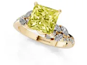 Fancy Yellow Princess Cut Diamond Solitaire Ring Set in Yellow gold with Marquise Twist Band and Prong Setting