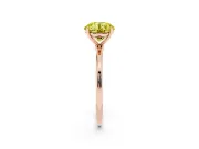 Fancy Yellow Round Cut Diamond Solitaire Engagement Ring Set in Rose gold with Thin Band and Prong Setting