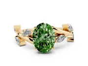 Fancy Green Oval Cut Diamond Solitaire Ring Set in Yellow gold with Twisted Marquise Accent Band