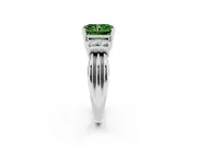 Fancy Green Three-Stone Radiant Cut Diamond Channel Set Ring Set in Platinum with Bar Prongs