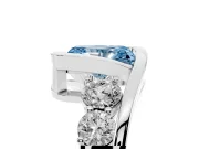 Fancy Blue Radiant Cut Diamond Bezel Bypass Ring Set in White gold with Round Accents
