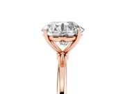 Round Cut Diamond Solitaire Engagement Ring Set in Rose gold with Thin Band and Prong Setting