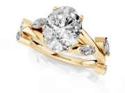 Oval Cut Diamond Solitaire Ring Set in Yellow gold with Twisted Marquise Accent Band