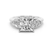 Three-Stone Princess Cut Diamond Ring Set in Platinum with Pear Side Stones and Prong Setting