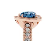 Fancy Blue Heart Cut Diamond Halo Ring Set in Rose gold with Round Accent Halo, Pavé Band and Prong Setting