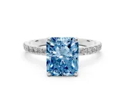 Fancy Blue Radiant Cut Diamond Solitaire Ring Set in Silver with Round Pavé Band and Prong Setting