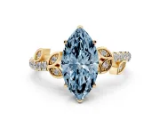 Fancy Blue Marquise Cut Diamond Solitaire Leaf-Inspired Ring Set in Yellow gold with Pavé Band and Prong Setting