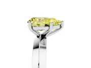 Fancy Yellow Pear Cut Diamond Solitaire Engagement Ring Set in Platinum with Flat Band and Prong Setting