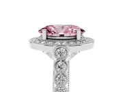 Fancy Pink Oval Cut Diamond Milgrain Halo Solitaire Ring Set in Platinum with Bezel Set Side Stones and Pavé Band