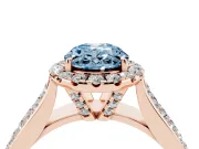 Fancy Blue Oval Cut Diamond Halo Ring Set in Rose gold with Pavé Band and Raised Center Setting