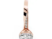 Radiant Cut Diamond Engagement Ring Set in Rose gold with Side Stone Accents and Prong Setting