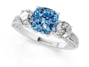 Fancy Blue Cushion Cut Diamond Three-Stone Ring Set in Platinum with Round Side Stones and Pavé Band