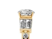 Round Cut Diamond Engagement Ring Set in Yellow gold with Baguette Side Stones and Channel Set Band