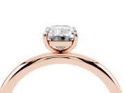 Emerald Cut Diamond Solitaire Ring Set in Rose gold with Prong Setting on a Polished Plain Band