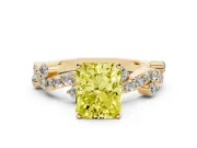 Fancy Yellow Radiant Cut Diamond Solitaire Twisted Band Set in Yellow gold with Pavé Setting