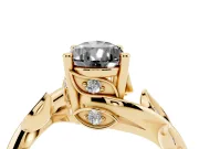 Fancy Black Pear Cut Diamond Solitaire Twist Engagement Ring Set in Yellow gold with Pavé Leaf Accents