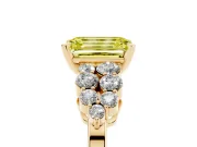 Fancy Yellow Emerald Cut Diamond Cluster Engagement Ring Set in Yellow gold with Pavé Band and Prong Setting