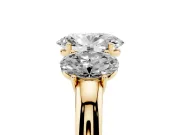Oval Cut Diamond Three-Stone Ring Set in Yellow gold with Bold Center and Classic Band