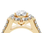 Pear Cut Diamond Halo Engagement Ring Set in Yellow gold with Split Shank and Prong Setting