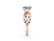 Fancy Blue Pear Cut Diamond Solitaire Ring Set in Rose gold with Side Stones on Criss-Cross Band and Prong Setting