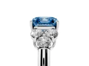 Fancy Blue Asscher Cut Diamond Cluster Ring Set in Platinum with Round Accent Stones and Prong Setting on a Plain Band