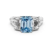 Fancy Blue Emerald Cut Diamond Three-Stone Ring Set in Platinum with Braided Band