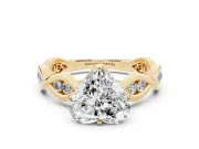 Heart Cut Diamond Twist Band Solitaire Ring Set in Yellow gold with Leaf Prong Setting and Accent Stones