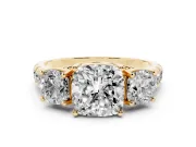 Cushion Cut Diamond Three-Stone Ring Set in Yellow gold with Pavé Band