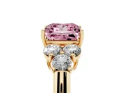 Fancy Pink Princess Cut Diamond Cluster Ring Set in Yellow gold with Round Accent Stones and Prong Setting on a Plain Band