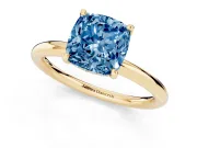 Fancy Blue Cushion Cut Diamond Solitaire Ring Set in Yellow gold with Thin Band and Prong Setting