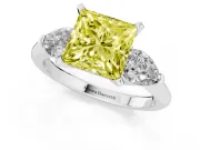 Fancy Yellow Three-Stone Princess Cut Diamond Ring Set in White gold with Pear Side Stones and Prong Setting