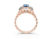 Fancy Blue Emerald Cut Diamond Three-Stone Ring Set in Rose gold with Braided Band