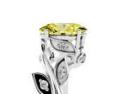 Fancy Yellow Oval Cut Diamond Solitaire Twist Engagement Ring Set in Platinum with Pavé Leaf Accents