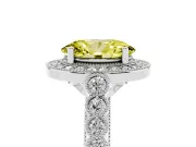 Fancy Yellow Oval Cut Diamond Milgrain Halo Solitaire Ring Set in Silver with Bezel Set Side Stones and Pavé Band