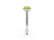 Fancy Yellow Cushion Cut Diamond Halo Engagement Ring Set in Platinum with Pavé Band and Prong Setting