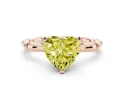 Fancy Yellow Heart Cut Diamond Solitaire Ring Set in Rose gold with Bamboo Band and Prong Setting