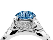 Fancy Blue Round Cut Diamond Leaf-Inspired Engagement Ring Set in White gold with Round Accents