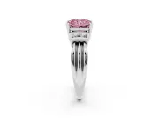 Fancy Pink Three-Stone Radiant Cut Diamond Channel Set Ring Set in Platinum with Bar Prongs