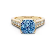 Fancy Blue Cushion Cut Diamond Solitaire Pavé Engagement Ring Set in Yellow gold with Prong Setting