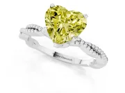 Fancy Yellow Heart Cut Diamond Solitaire Ring Set in White gold with Twisted Band and Bead Prong Setting