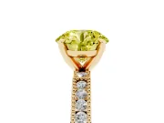 Fancy Yellow Round Cut Diamond Solitaire Ring Set in Yellow gold with Slim Pavé Band and Prong Setting