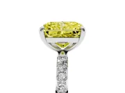 Fancy Yellow Radiant Cut Diamond Solitaire Ring Set in Silver with Round Pavé Band and Prong Setting