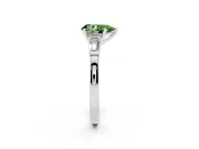 Fancy Green Pear Cut Diamond Solitaire Ring Set in Platinum with Tapered Baguette Accents and Prong Setting