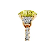 Fancy Yellow Round Cut Diamond Three-Stone Ring Set in Yellow gold with Pavé Band and Graduated Sides