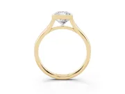 Bezel Set Radiant Cut Diamond Solitaire Ring Set in Yellow gold with Tapered Band