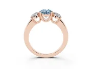 Fancy Blue Oval Cut Diamond Three-Stone Ring Set in Rose gold with Polished Band and Prong Setting